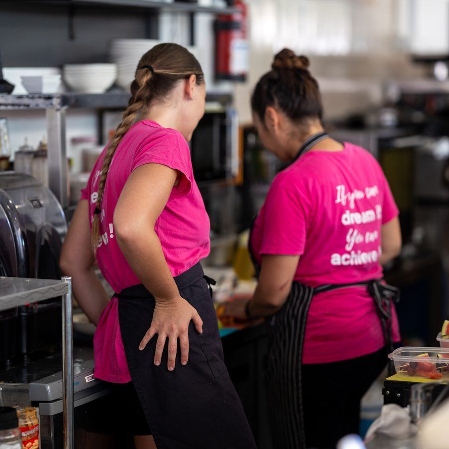 A cook at the pass in the Café Nomad kitchen.